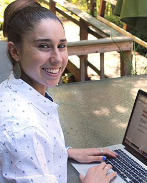 Photo of Diana D/Achille with her laptop